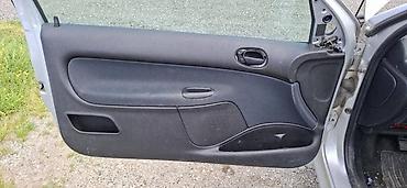 golf 2 1.8 benzin: TAPACIRI VRATA CRNI ZA 3 VRATA ZA PEUGEOT 206 | tapaciri vrata — 1