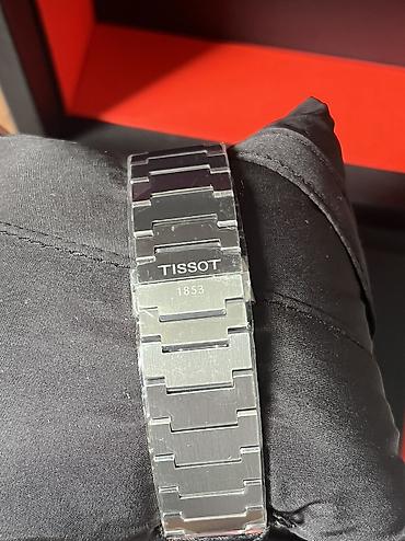 винтажное: Tissot PRX — швейцарские кварцевые часы с интегрированным стальным — 10