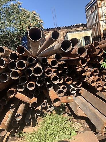 Металлопрокат: круглые трубы: Стальные трубы и швеллер Описание: - Круглые стальные трубы разного — 3