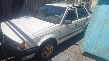 saab 93: Mazda 323: 1989 г., 1.6 л, Механика, Бензин, Седан — 2