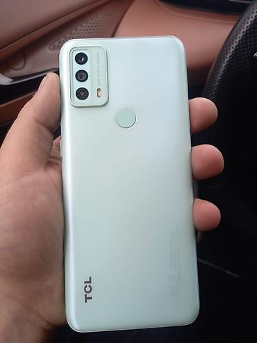 nomre: TCL smartfon satılır. Cihaz açıq yaşıl 2 nomredi. NFC var donmasi — 2