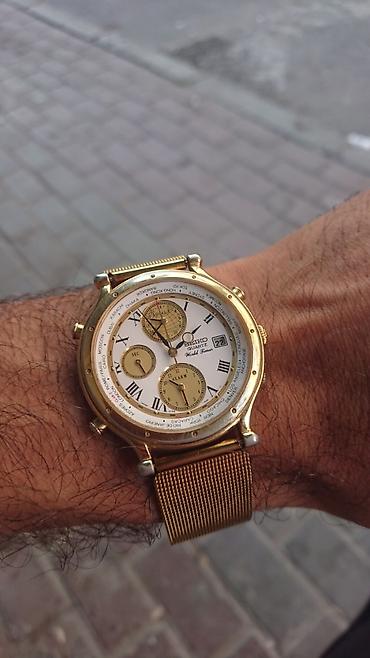 saat michael kors: Seiko Quartz World Timer qol saatı - Model: Seiko 5T52-7A19 (arxa — 7