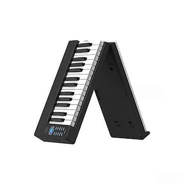 sintezator kreditle: Qatlanan piano, 61 klavişqatlanan piano 61 klavis Təsvir : Qatlanan — 1