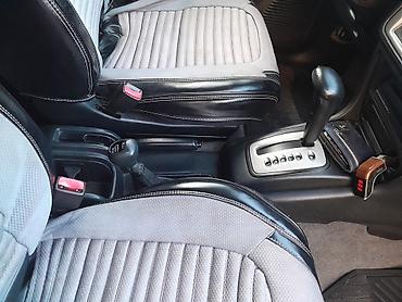 Mitsubishi: Mitsubishi Pajero IO (ağ rəng) – kompakt, çevik və tam ötürücülü — 6