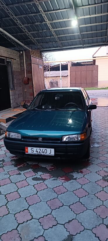 Mazda 323: 1994 г., 1.3 л, Механика, Бензин, Седан