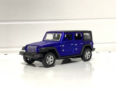 кыргыз гойнок: Металлическая модель внедорожника 4x4 (похожа на Jeep Wrangler)