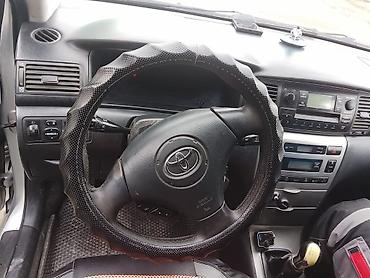 на corolla: Toyota Corolla: 2004 г., Механика, Универсал — 3