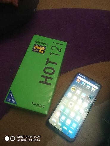 Мобильные телефоны: Infinix Hot 12i, 64 ГБ, цвет - Голубой, Сенсорный — 5