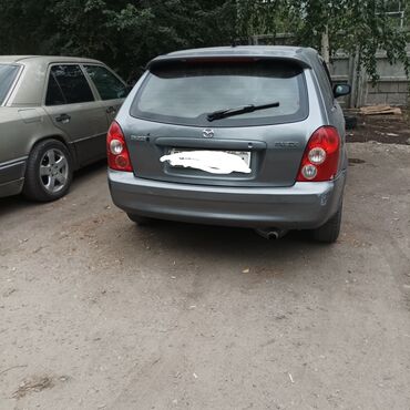 303 эшка: Mazda 323: 2003 г., 1.6 л, Механика, Бензин, Хетчбек