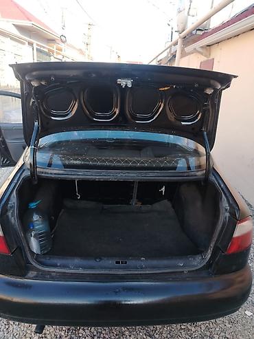Daewoo: Daewoo Nexia: 1.3 l | 2010 il Sedan — 9