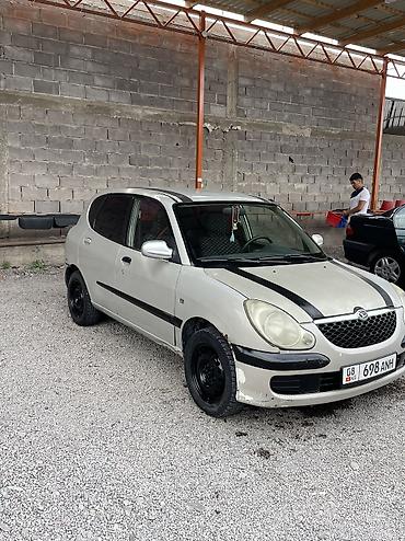 нюрайс машина: Daihatsu Sirion: 2003 г., 1 л, Механика, Бензин, Хэтчбэк — 3