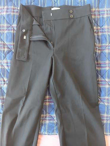 Pantalone: H&M Crne elegantne ženske pantalone sa širokom nogavicom. Model — 3