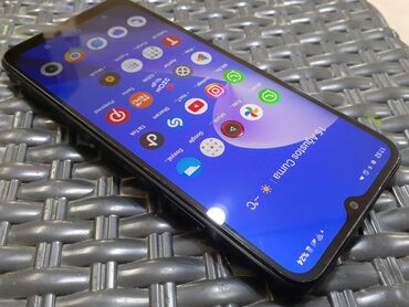 Realme C33 2023, 128 ГБ, цвет - Синий, Кнопочный, Сенсорный, Отпечаток пальца