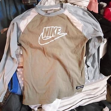 arilje pamučne majice: Nike dečja majica dugih rukava, sportsko-casual model sa upečatljivim — 1