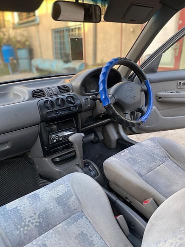 zero x neo: Nissan March: 2000 г., Автомат, Хэтчбэк — 10