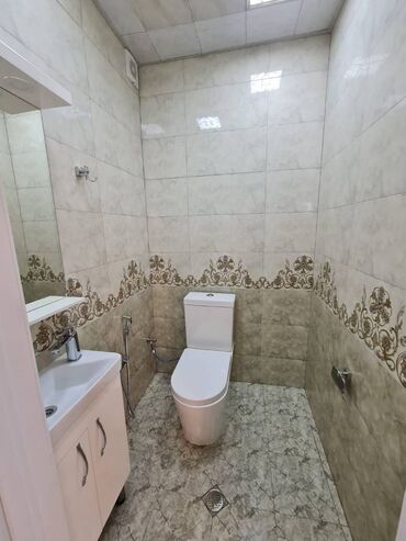 Uzunmüddətli kirayə mənzillər: Memar Əcəmi metrosunun üsdündə 14 mərtəbəli binanın 12-ci mərtəbəsində — 10