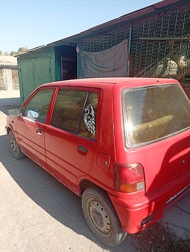 12 220: Daihatsu Cuore: 1991 г., 0.8 л — 2