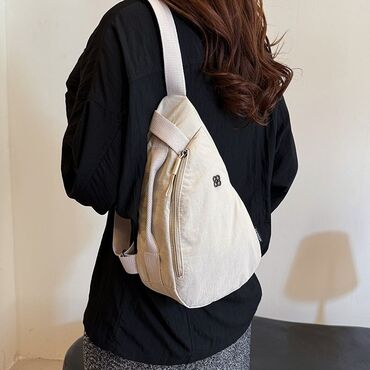 Другие сумки: Сумка-слинг через плечо, светло-бежевый цвет. - Формат — 7