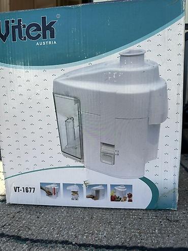 Соковыжималка Vitek VT-1677 - Компактная центробежная соковыжималка