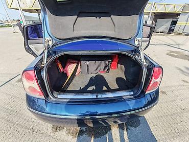changan disk: Volkswagen Passat sedan. Avtomobil tünd göy rəngdədir və klassik — 4