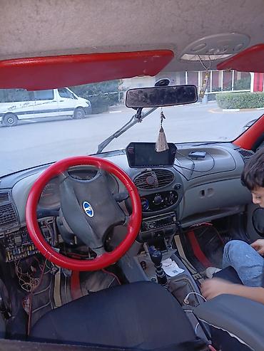 4 qapi niva: LADA Kalina sedan – qırmızı rəng hec bir xerc təlb etmir otur sur — 3