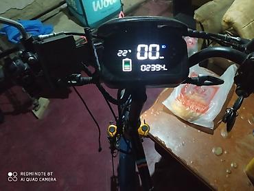 velosiped mingecevir: Elektrikli velosiped / moped tipli nəqliyyat vasitəsi. Şəkillərdə qara — 2