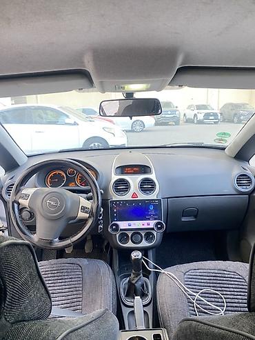 Opel: Opel Corsa CDTI, gümüşü rəng, 5 qapılı hetçbek. Texniki — 9