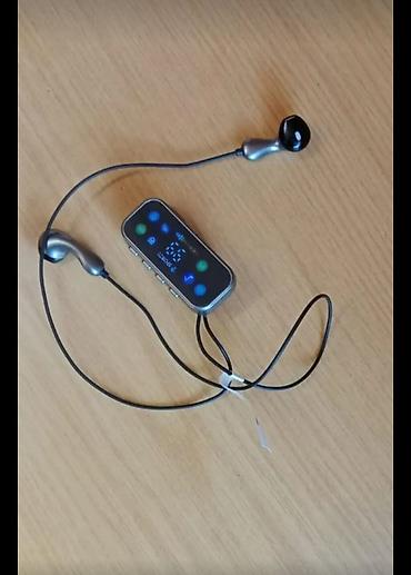 macbook pro 2021: Portativ MP3 pleyer qulaqlıq dəsti - Kompakt korpuslu rəqəmsal MP3 — 1