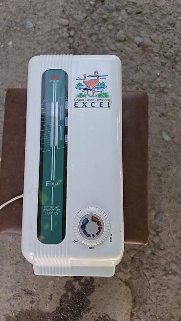 cd disk: Проточный электрический водонагреватель EXCEL 330 - Компактный — 1