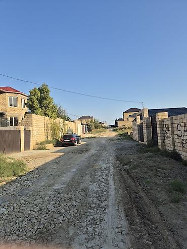 yeni coratda heyet evleri: Tikinti — 1
