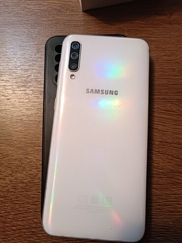 Мобильные телефоны: Samsung A50, Б/у, 64 ГБ, цвет - Белый, 2 SIM