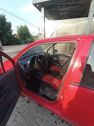 сидение тико: Компактный городской хэтчбек Daewoo Matiz (5 дверей), красный цвет — 3