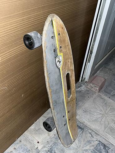 2 tekerli scooter: Taxta gövdəli retro üslubda longboard/skateboard. Xüsusiyyətlər: - — 1
