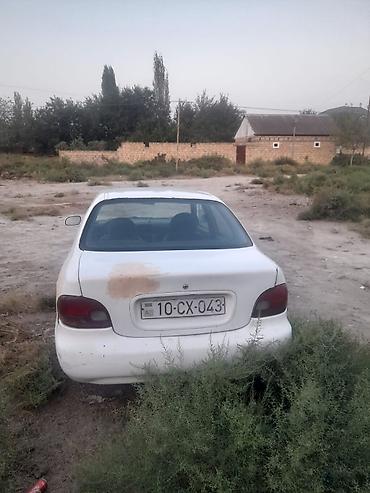 ltz rs bufer: Ağ rəngli sedan avtomobil Xüsusiyyətlər: - Korpus: 4 qapılı sedan — 1