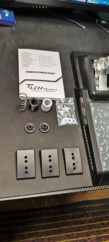 Рули: Комплект для симрейсинга Thrustmaster + аксессуары Состав: - Руль — 19