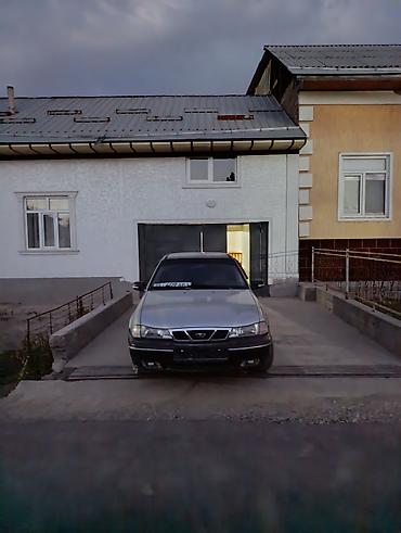 1 тонна: Daewoo Nexia: 2006 г., Кол менен иштөөчү, Бензин, Седан — 5