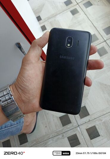 телефон fly lq239: Samsung Galaxy J4 2018, 16 ГБ, цвет - Черный, Кнопочный, Отпечаток пальца, Face ID