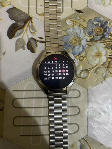 Smart saatlar: Metal qayışlı, dairəvi displeyli ağıllı saat. Xüsusiyyətlər: - Tam — 10