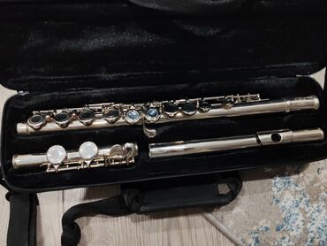 Musiqi alətləri üçün ləvazimatlar: Moresky brendinin fleytası. 170 manata satılır. Amazondan alınıb. Real