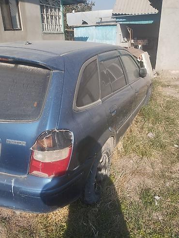 е 34 тарпеда сидения: Mazda 323: 2001 г., 1.6 л, Механика, Бензин, Универсал — 5