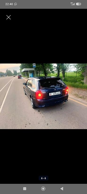 щуп демио: Mazda Familia: 2002 г., Хэтчбэк — 6