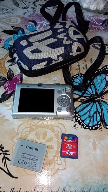 фотоаппарат никон полупрофессиональный: Canon Digital IXUS 95 IS fotokamera Xüsusiyyətlər: - 10.0 MP CCD