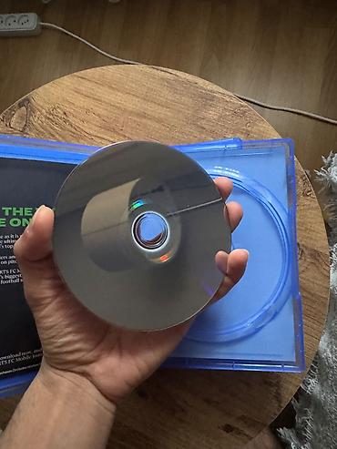 PS5 (Sony PlayStation 5): Ps5 üçün Fc24, God of War və Resident evil 4 Remake. Oyunların hər — 9