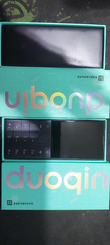 mini android telefonlar: DuoQin öğrenci telefonu – düyməli, kompakt və ağıllı funksiyalarla — 5
