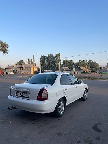 Транспорт: Daewoo Nubira: 1997 г., Бензин, Седан — 4