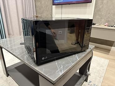 микроволновая печь lg: Микроволновая печь LG MS2042DB, 20 л - Компактная СВЧ-печь в черном — 1