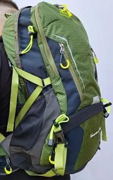 Sportske torbe i rančevi: Planinarski/trekking ranac Adventure 50L – maslinasto zeleni sa fluoro — 21