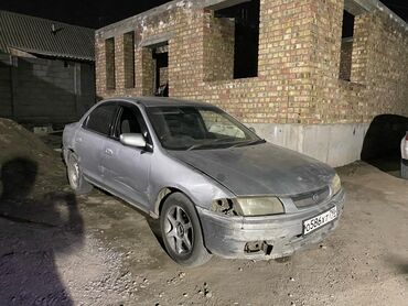 Mazda: Mazda Familia: 1997 г., 1.5 л, Автомат, Бензин, Седан