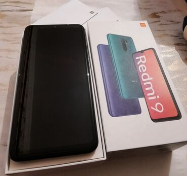 xiomi 10 t: Xiaomi Redmi 9, 32 GB, rəng - Qara, 
 İki sim kartlı, Sensor, Barmaq izi