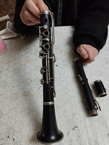 Klarnetlər: A Klarnet ( 4 açqi ) taxta Təsvir: - Qara korpus, metal klapan və — 7